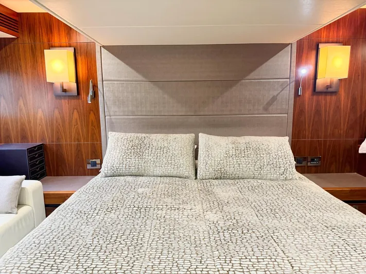 The Office Yacht Photos Pics Luxurious bedroom interior of 2015 Sunseeker Manhattan 55 yacht with elegant lighting.