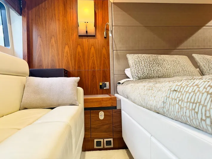 The Office Yacht Photos Pics Luxurious interior of 2015 Sunseeker Manhattan 55 yacht with elegant bedding and seating.