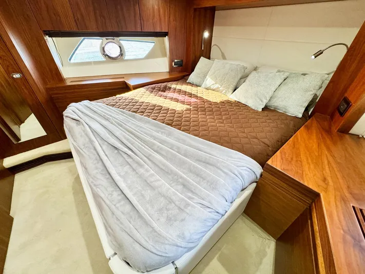 The Office Yacht Photos Pics Luxurious cabin interior of 2015 Sunseeker Manhattan 55 yacht with cozy bedding.