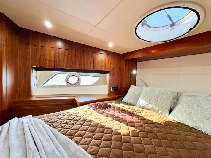 The Office Yacht Photos Pics Luxurious cabin interior of 2015 Sunseeker Manhattan 55 yacht with elegant wood finish.