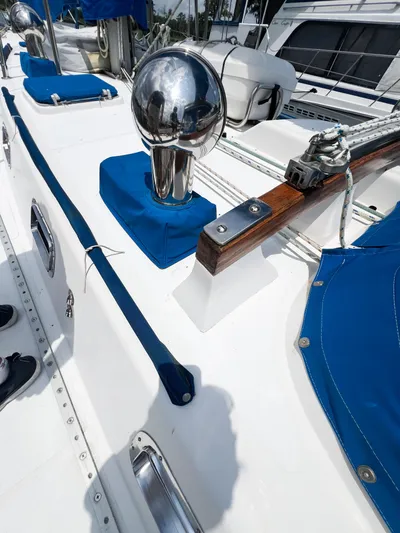 Della Therese Yacht Photos Pics 1986 Tayana Vancouver 42 yacht deck with blue covers and polished metal fittings.