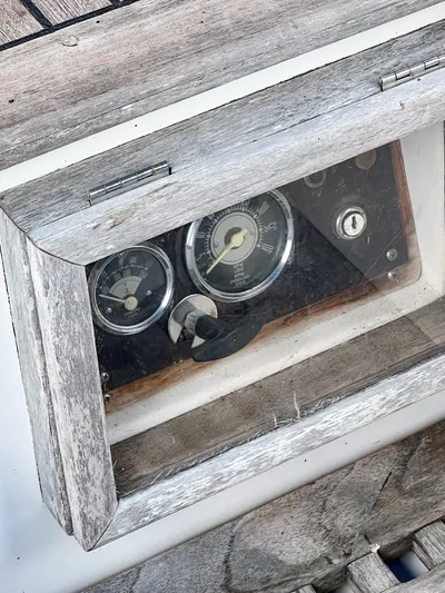 Della Therese Yacht Photos Pics Vintage Tayana Vancouver 42 boat dashboard with gauges, 1986 model, weathered wood frame.