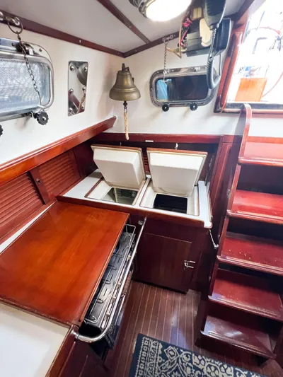 Della Therese Yacht Photos Pics Interior of 1986 Tayana Vancouver 42 sailboat with wooden cabinetry and steps.