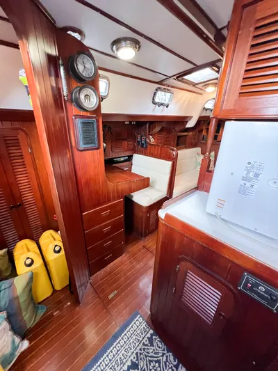 Della Therese Yacht Photos Pics Interior of 1986 Tayana Vancouver 42 sailboat with wooden furnishings and nautical decor.