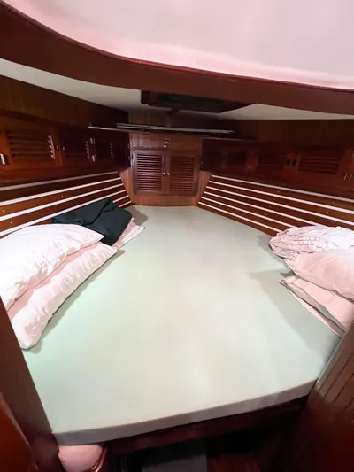 Della Therese Yacht Photos Pics Cozy cabin interior of 1986 Tayana Vancouver 42 sailboat with wooden finish.