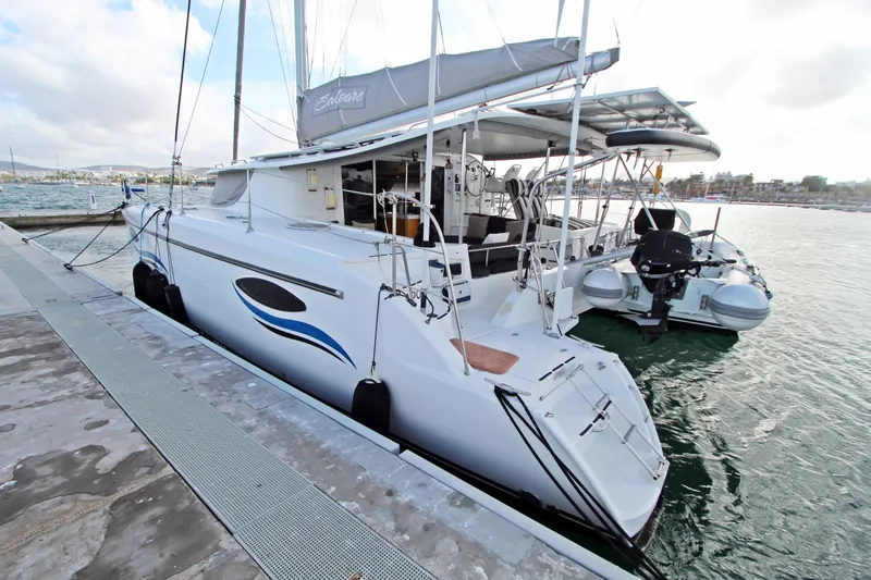  Yacht Photos Pics 2008 Fountaine Pajot Orana 44 catamaran docked at marina, rear view.