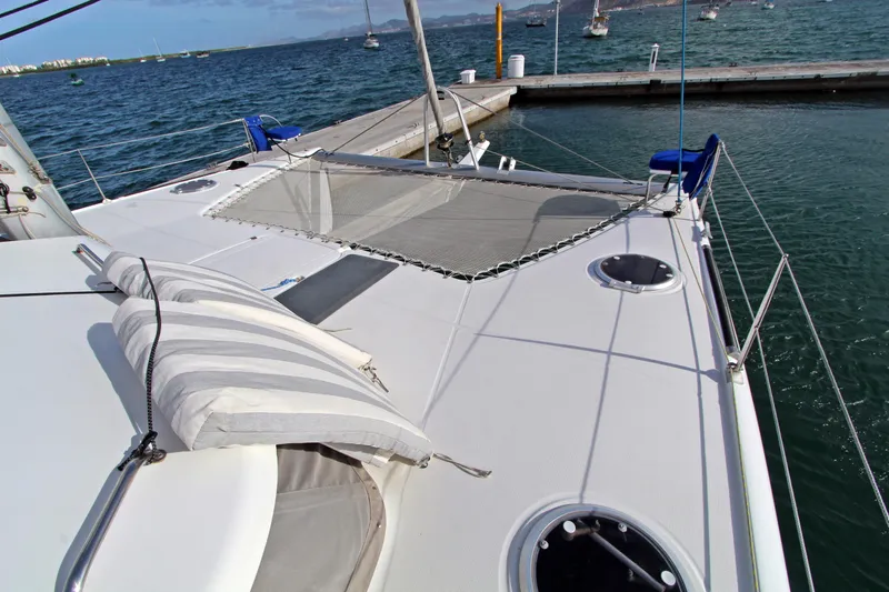  Yacht Photos Pics 2008 Fountaine Pajot Orana 44 catamaran deck with netting and ocean view.