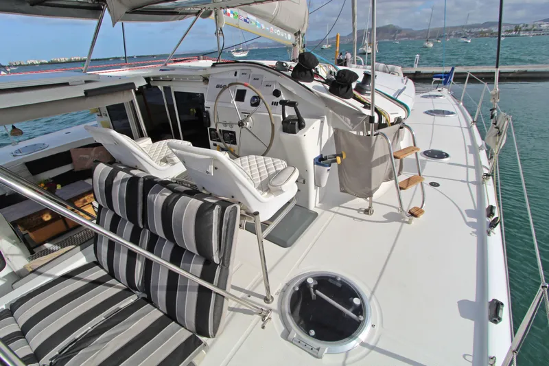  Yacht Photos Pics 2008 Fountaine Pajot Orana 44 catamaran deck with helm and seating area.