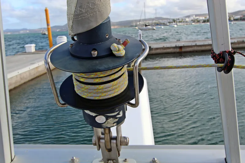  Yacht Photos Pics Close-up of a 2008 Fountaine Pajot Orana 44 sailboat winch by the water.