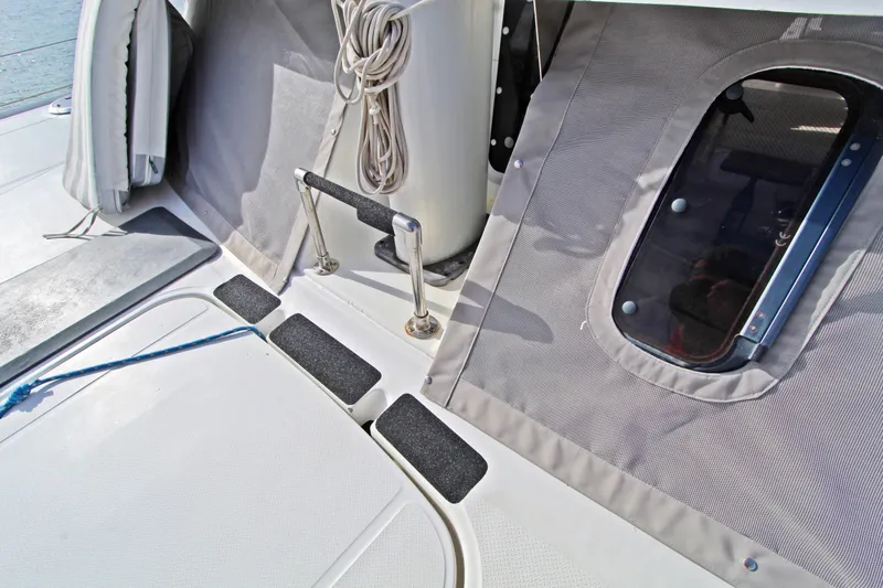  Yacht Photos Pics Deck view of 2008 Fountaine Pajot Orana 44 catamaran with ropes and window.