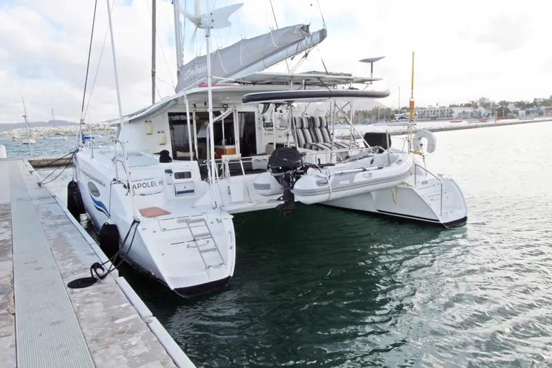 Yacht Photos Pics 2008 Fountaine Pajot Orana 44 catamaran docked at marina, rear view.