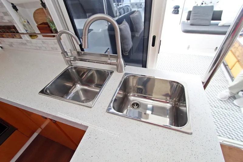  Yacht Photos Pics Modern kitchen sink area on 2008 Fountaine Pajot Orana 44 catamaran.