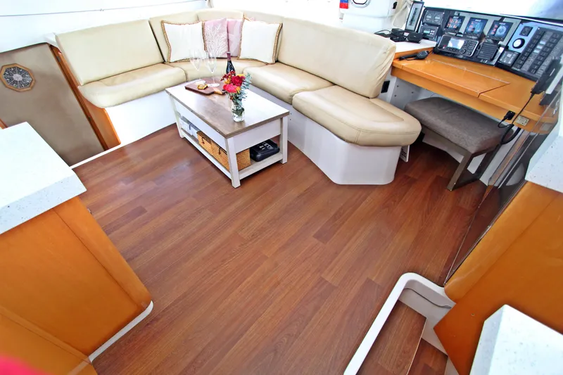  Yacht Photos Pics Luxurious interior of 2008 Fountaine Pajot Orana 44 catamaran with elegant seating and navigation area.