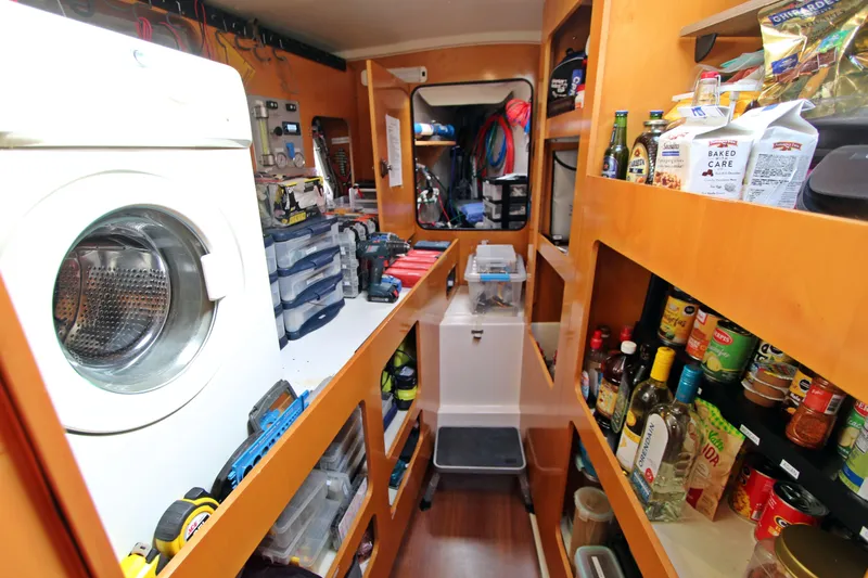  Yacht Photos Pics Laundry and storage area inside 2008 Fountaine Pajot Orana 44 catamaran.
