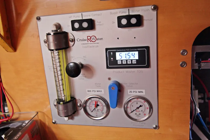  Yacht Photos Pics Control panel of a 2008 Fountaine Pajot Orana 44 water system, featuring gauges and switches.