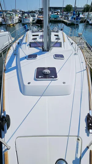 Superstition Yacht Photos Pics 2012 Beneteau Oceanis 40 sailboat deck view in marina, showcasing sleek design and spacious layout.