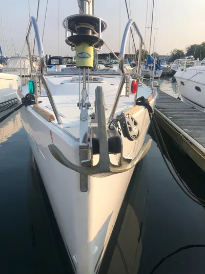 Superstition Yacht Photos Pics Beneteau Oceanis 40 sailboat, 2012 model, docked in a marina, front view.