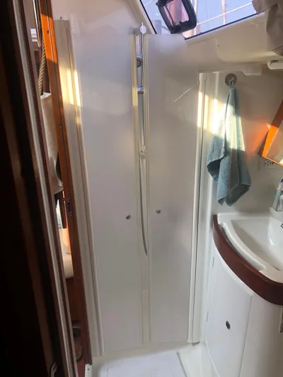 Superstition Yacht Photos Pics Beneteau Oceanis 40 yacht bathroom with shower, sink, and towel, 2012 model.