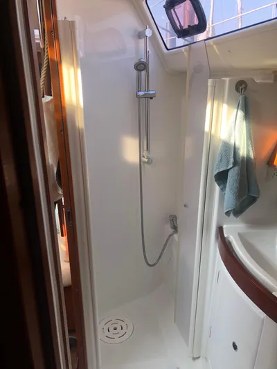 Superstition Yacht Photos Pics Beneteau Oceanis 40 yacht shower area, 2012 model, with modern fixtures and natural lighting.