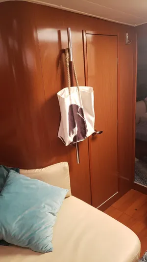 Superstition Yacht Photos Pics Interior of 2012 Beneteau Oceanis 40 sailboat with wooden paneling and cozy seating.