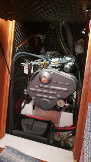 Superstition Yacht Photos Pics Yanmar engine in a 2012 Beneteau Oceanis 40 sailboat, showcasing compact marine engineering.