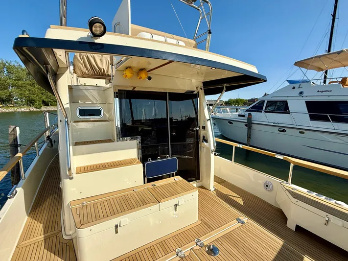  Yacht Photos Pics 2016 Targa 44 yacht with spacious deck and modern design, docked at marina.