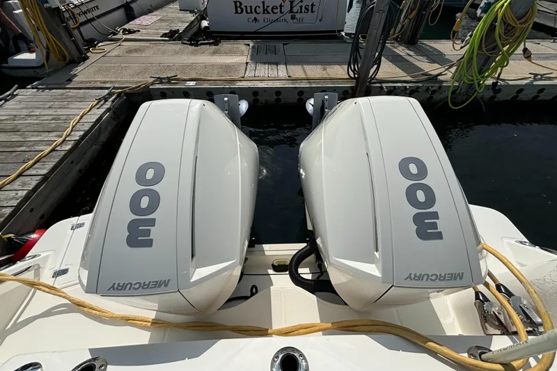  Yacht Photos Pics Twin Mercury 300 engines on a 2020 Boston Whaler 325 Conquest Pilothouse at dock.