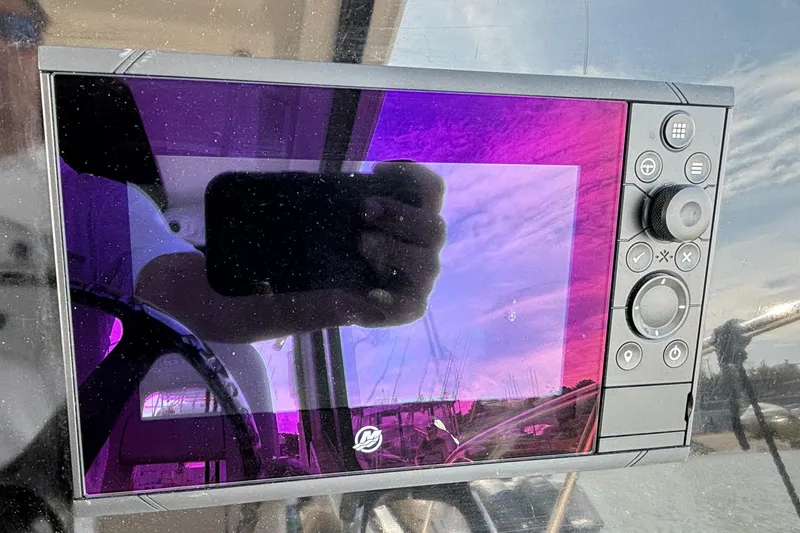  Yacht Photos Pics Boat control panel with reflection, Boston Whaler 325 Conquest Pilothouse, 2020 model.