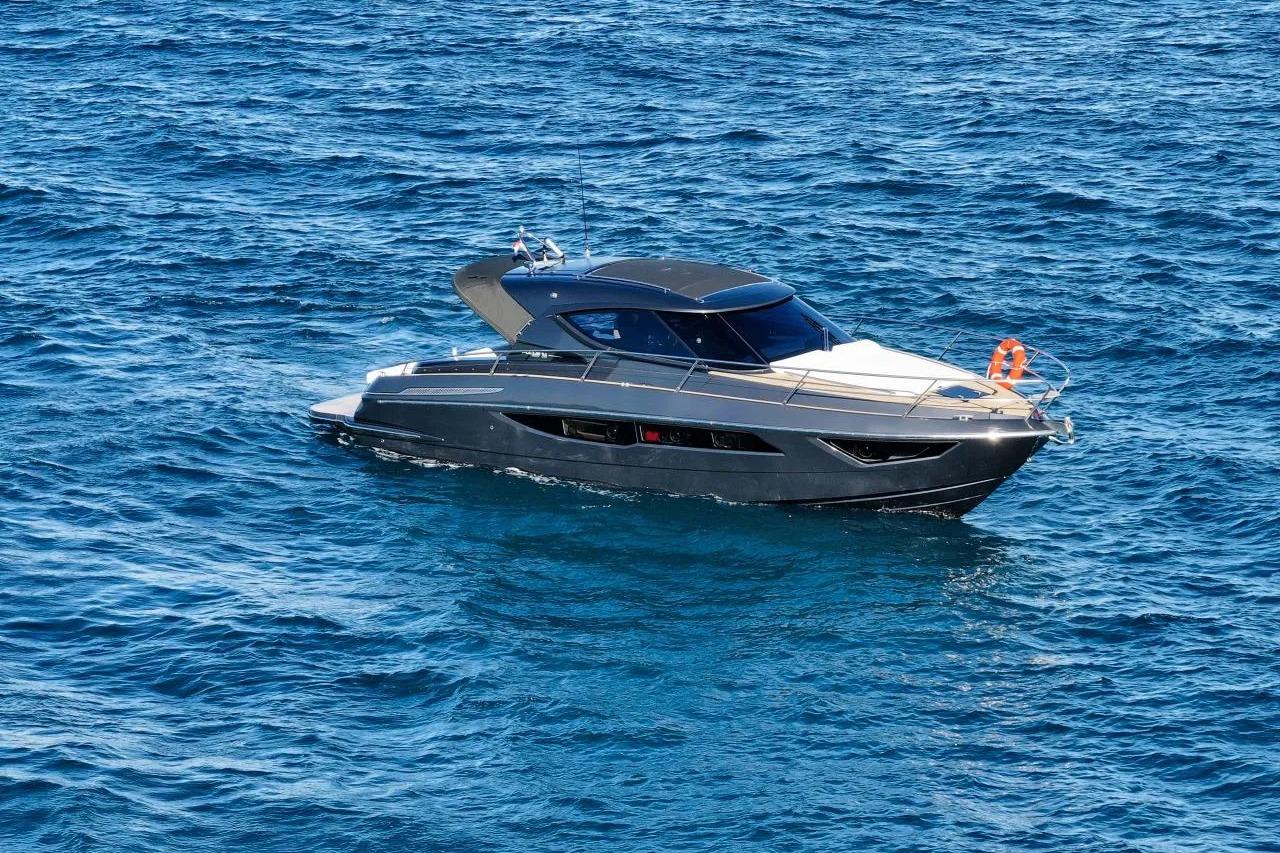 2023 Focus Power 36 yacht cruising on open blue sea.
