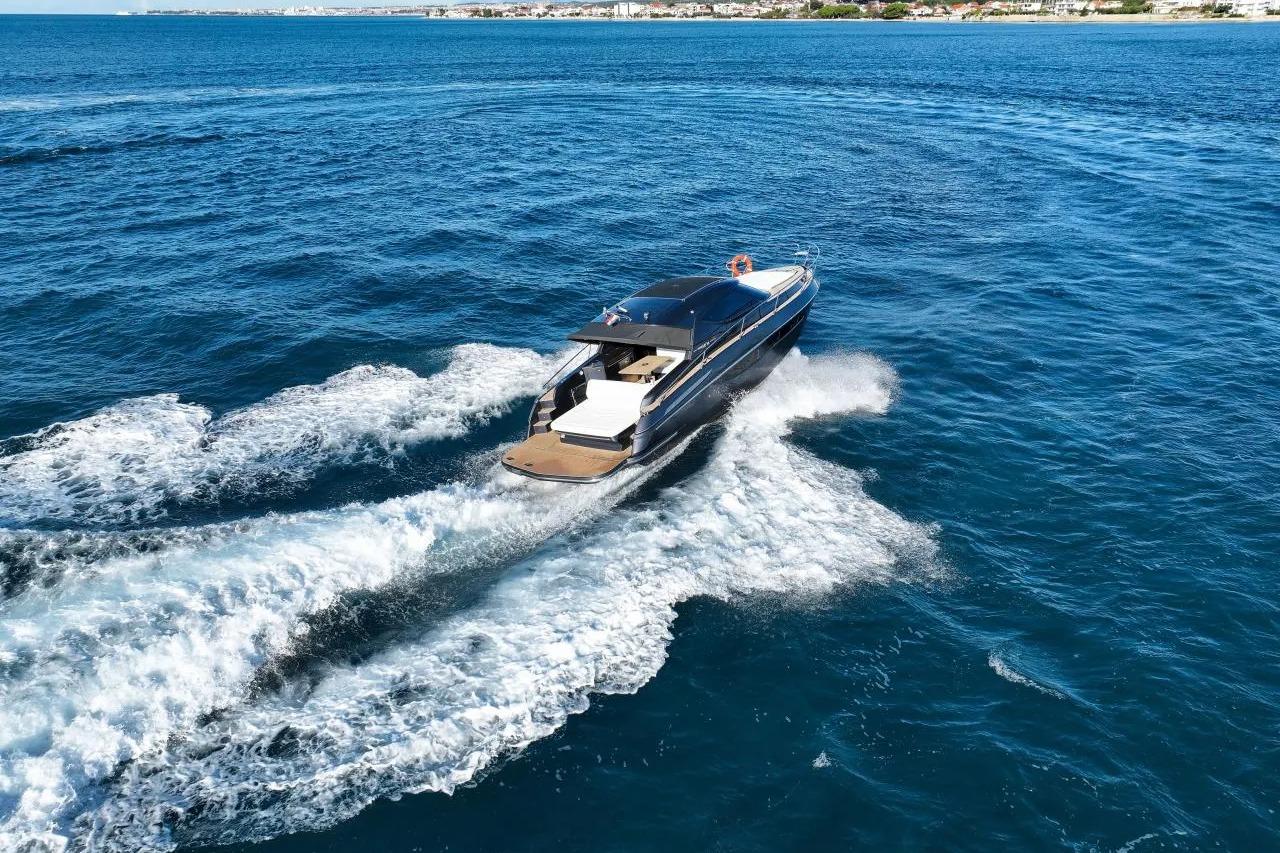 2023 Focus Power 36 yacht cruising on open blue sea.