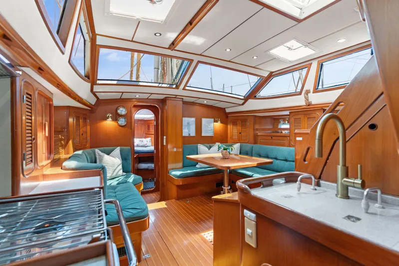 Callahan Yacht Photos Pics Luxurious interior of 2000 Ta Shing Taswell 44 All Season yacht with elegant wood finish.