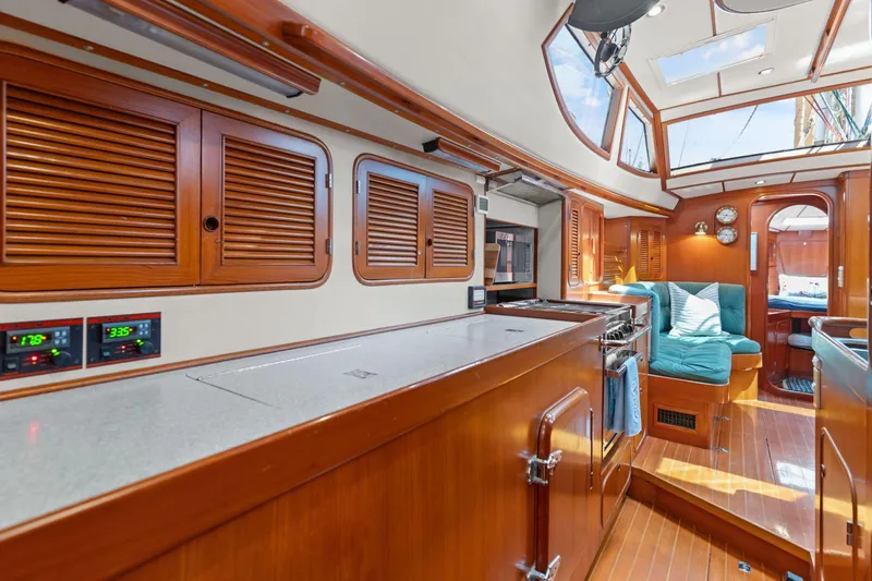 Callahan Yacht Photos Pics Luxurious 2000 Ta Shing Taswell 44 All Season yacht interior with wood finish and skylights.