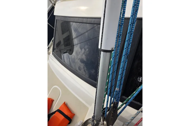 Callahan Yacht Photos Pics Close-up of 2000 Ta Shing Taswell 44 All Season sailboat deck with ropes and window.