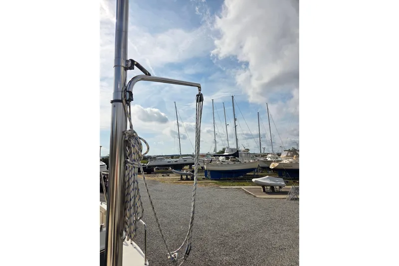 Callahan Yacht Photos Pics Sailboats docked under a cloudy sky, featuring a 2000 Ta Shing Taswell 44 All Season.