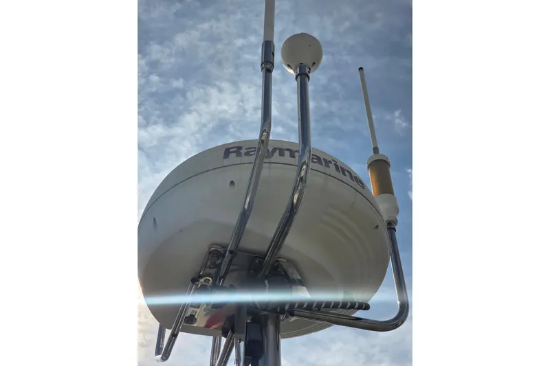 Callahan Yacht Photos Pics Radar equipment on a 2000 Ta Shing Taswell 44 All Season sailboat against a cloudy sky.