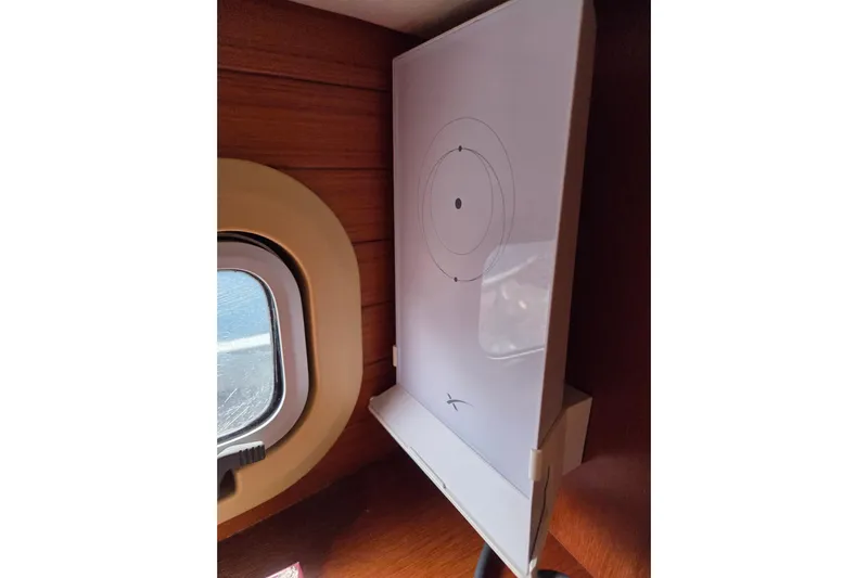 Callahan Yacht Photos Pics Interior of 2000 Ta Shing Taswell 44 All Season yacht with porthole and chart table.