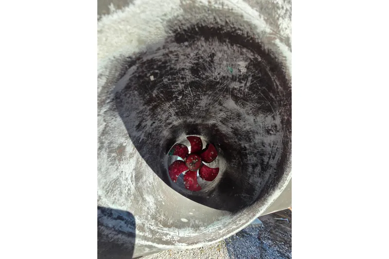 Callahan Yacht Photos Pics Bow thruster of 2000 Ta Shing Taswell 44 All Season yacht, showing red propeller.