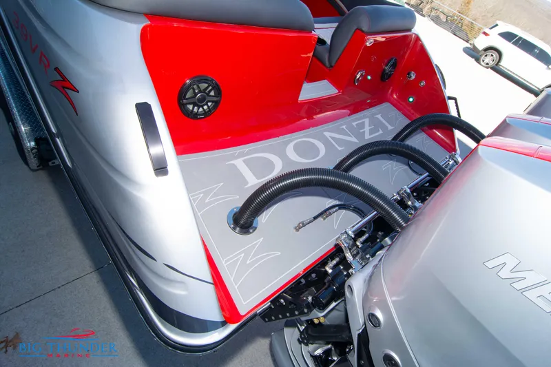  Yacht Photos Pics 2024 Donzi 39 VRZ boat stern with engine and seating.