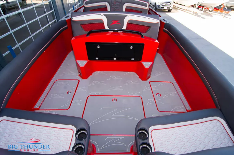  Yacht Photos Pics 2024 Donzi 39 VRZ boat interior with red and gray seating and flooring.