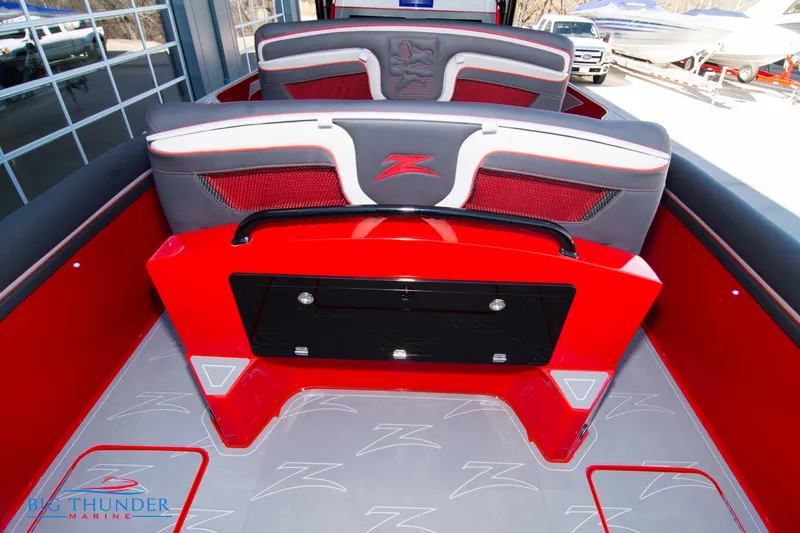  Yacht Photos Pics 2024 Donzi 39 VRZ boat interior with red and gray seating and flooring.
