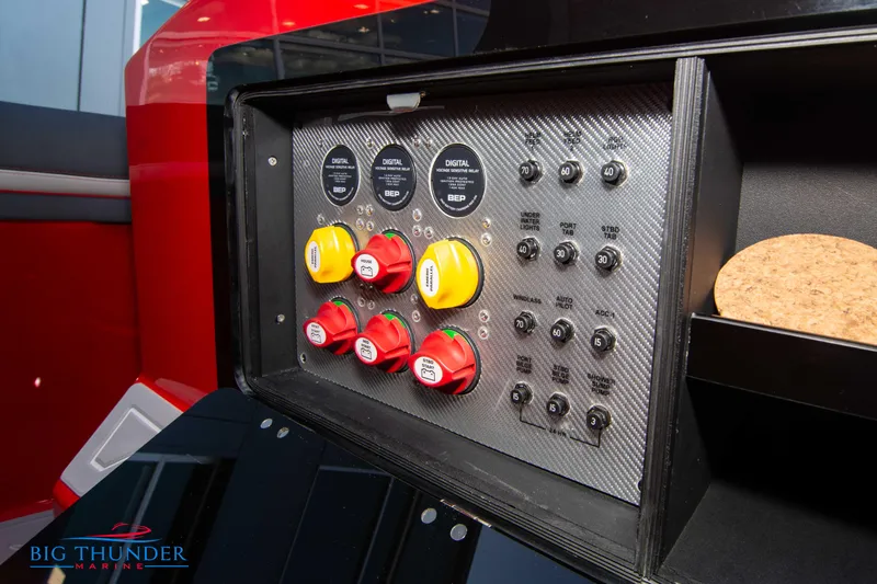  Yacht Photos Pics Control panel of 2024 Donzi 39 VRZ boat with switches and gauges.