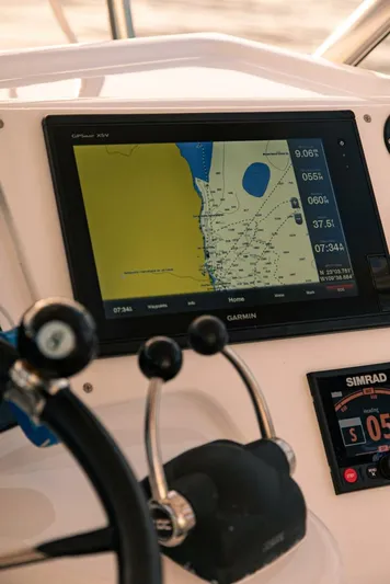 Skiesta Yacht Photos Pics Close-up of the navigation system on a 2002 Riviera 40 Flybridge yacht.