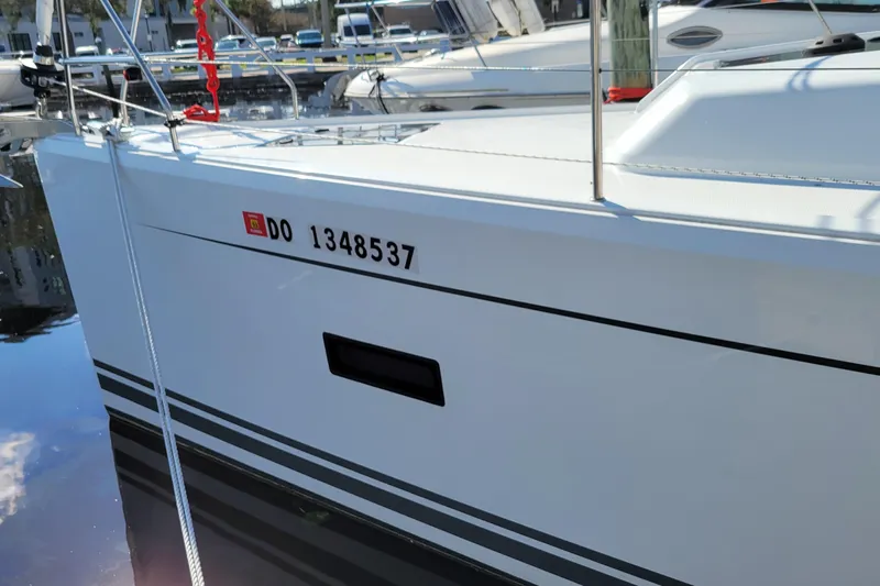  Yacht Photos Pics 2024 Hanse 388 yacht docked, displaying registration number DO 1348537.