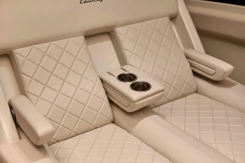  Yacht Photos Pics Manufacturer Provided Image: Luxurious seating on 2020 Chris-Craft Catalina 30 with diamond-stitched upholstery and cup holders.