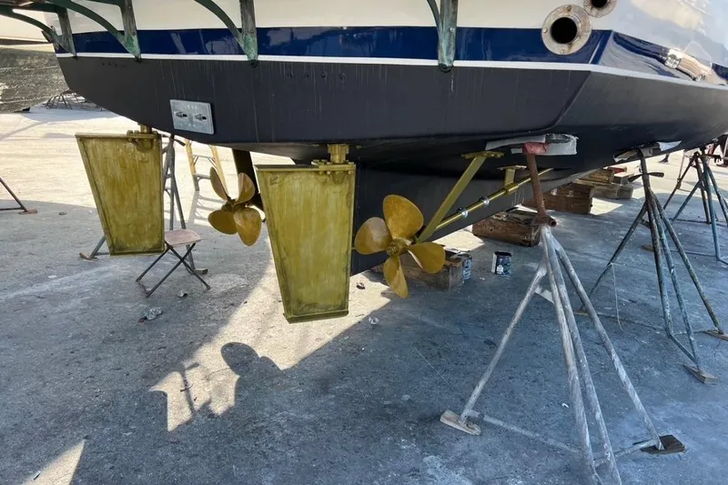 Bedouin Yacht Photos Pics 1998 DeFever 44 Sundeck Trawler on dry dock, showing propellers and rudders.