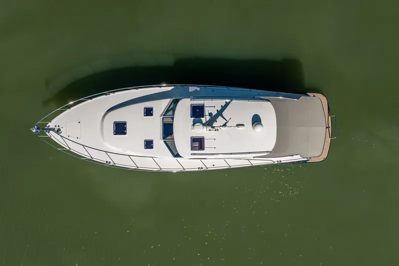 Miller Time Yacht Photos Pics Overhead view of 2017 Palm Beach Motor Yachts PB45 on calm green water.