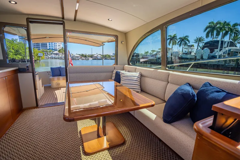 Miller Time Yacht Photos Pics Luxurious interior of 2017 Palm Beach Motor Yachts PB45 with waterfront view.