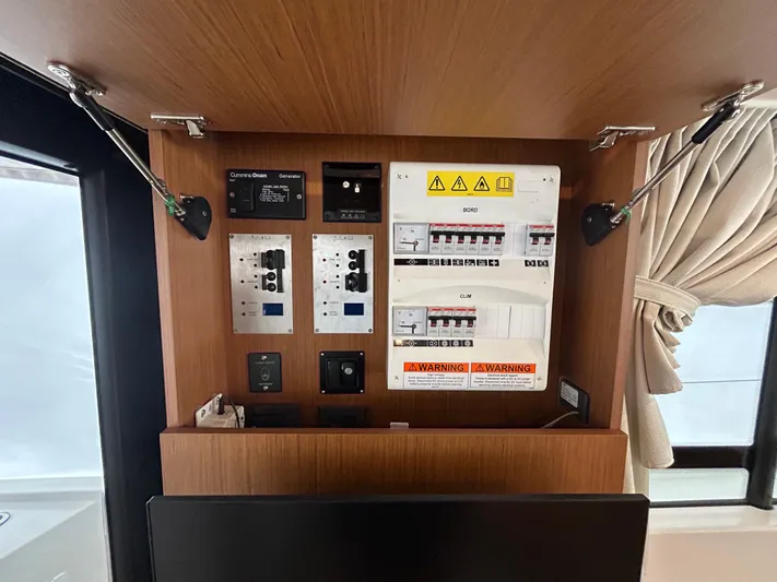  Yacht Photos Pics Electrical panel inside 2023 Beneteau Swift Trawler 35 yacht cabin.