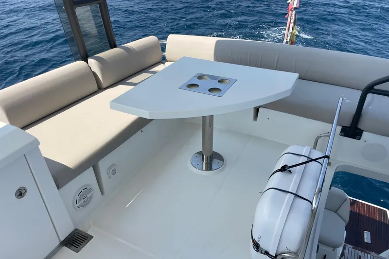  Yacht Photos Pics Luxury seating area on 2021 Prestige 460 yacht with ocean view.