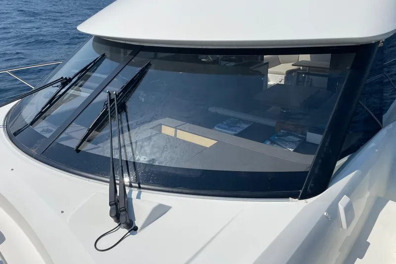  Yacht Photos Pics 2021 Prestige 460 yacht windshield with wipers, overlooking the ocean.